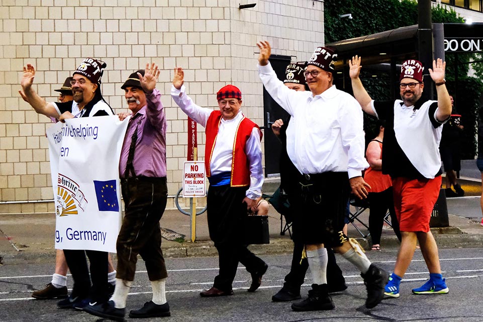 group of six Shriners walking