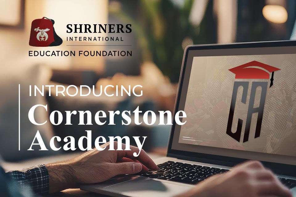 Shriners International logo, Cornerstone Academy logo, hands working on laptop