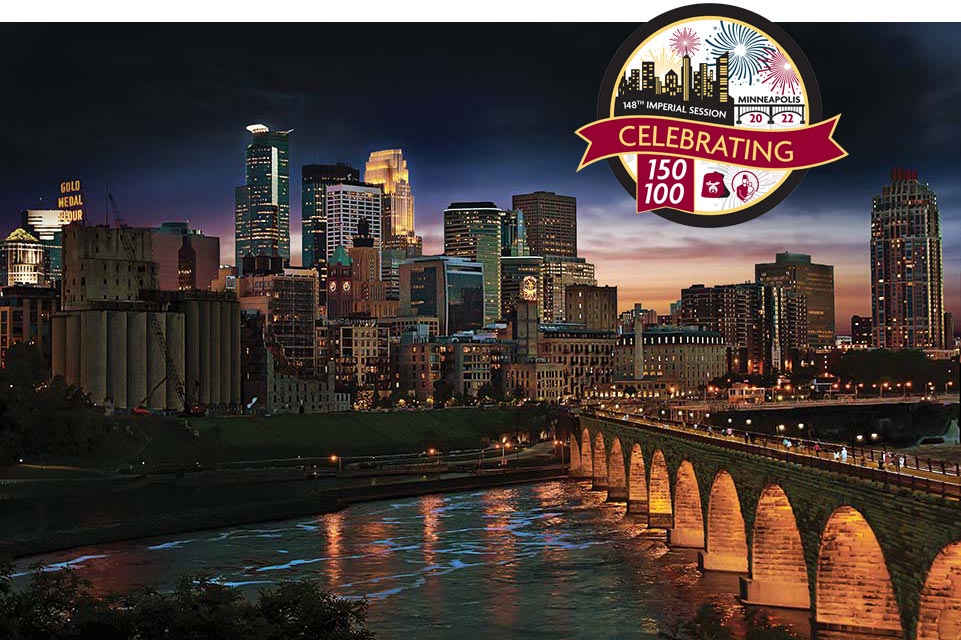 Minneapolis Skyline at night with anniversary logo